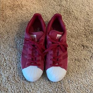 Adidas Superstar suede magenta sneakers